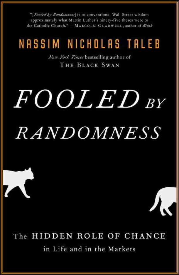 A simple black bookcover, with the title, subtitle, author's name and a blurb, along with two partial images of a white cat in silhouette